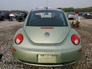 2010 Volkswagen New Beetle Coupe with VIN 3VWPW3AG5AM010674, listed as a Copart auction lot 51767595 with 134,418 mi miles and Salvage Title. Bid and sale history available at carsss.com. Image 6.