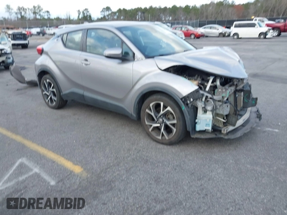 2019 Toyota C-HR XLE with VIN NMTKHMBX7KR078292, listed as a IAAI auction lot 41705966 with 104,352 mi miles. Bid and sale history available at carsss.com. Image 1.