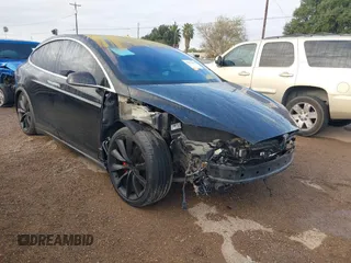 2016 Tesla Model X P90D with VIN 5YJXCBE46GFS00454, listed as a IAAI auction lot 41077696 with 94,489 mi miles. Bid and sale history available at carsss.com. Image 1.