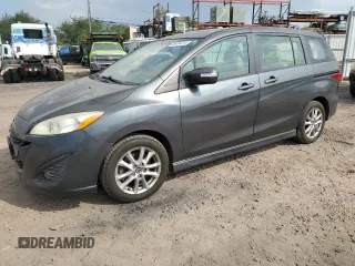 2015 Mazda 5 Touring with VIN JM1CW2CL5F0185622, listed as a Copart auction lot 86404414 with 59,586 mi miles and Salvage Title. Bid and sale history available at carsss.com. Image 1.