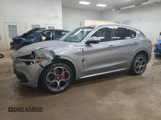 2020 Alfa Romeo Stelvio Ti z VIN ZASPAKBN1L7C88968, wystawiony jako Copart lot #51223235 z przebiegiem 79 530 mil mil oraz Szkody całkowita. Historia ofert i sprzedaży dostępna na DreamBid. Obrazek 1.