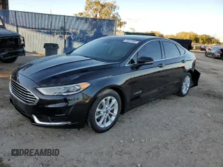 2019 Ford Fusion Hybrid SEL with VIN 3FA6P0MU7KR260813, listed as a Copart auction lot 73311492 with 70,783 mi miles. Bid and sale history available at carsss.com. Image 1.