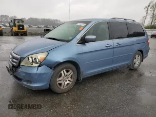 2005 Honda Odyssey EX-L with VIN 5FNRL38645B060123, listed as a Copart auction lot 51112735 with 227,247 mi miles and Salvage Title. Bid and sale history available at carsss.com. Image 1.