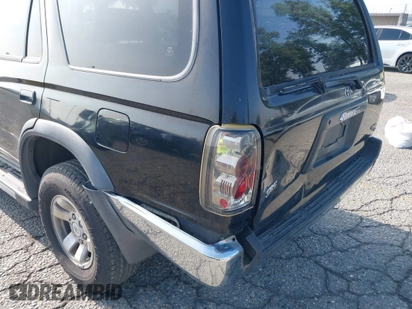 1998 Toyota 4Runner SR5 z VIN JT3GN86R0W0060376, wystawiony jako IAAI lot #42465641 z przebiegiem 321 550 mil mil oraz . Historia ofert i sprzedaży dostępna na DreamBid. Obrazek 6.