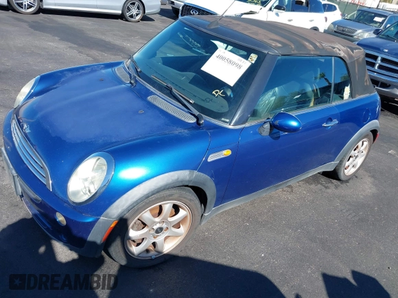 2007 MINI Convertible with VIN WMWRF33507TG16644, listed as a IAAI auction lot 40058098 with 163,215 mi miles and . Bid and sale history available at DreamBid. Image 2.