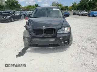 2013 BMW X5 xDrive35i z VIN 5UXZV4C58D0B21356, wystawiony jako Copart lot #54872375 z przebiegiem 113 825 mil mil oraz Szkoda całkowita • Salvage title. Historia ofert i sprzedaży dostępna na DreamBid. Obrazek 14.