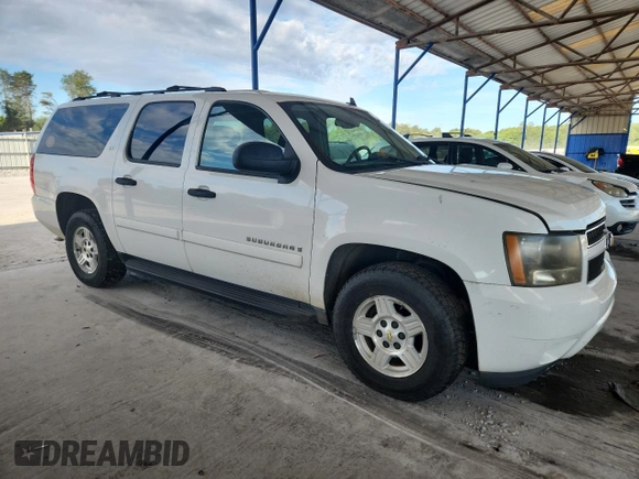 2007 Chevrolet Suburban LS with VIN 1GNFC16JX7R401981, listed as a Copart auction lot 64618945 with 153,205 mi miles and Clean title. Bid and sale history available at DreamBid. Image 4.