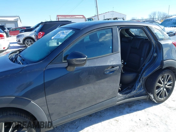2017 Mazda CX-3 Touring with VIN JM1DKFC72H0167205, listed as a IAAI auction lot 41333632 with 106,063 mi miles. Bid and sale history available at carsss.com. Image 15.