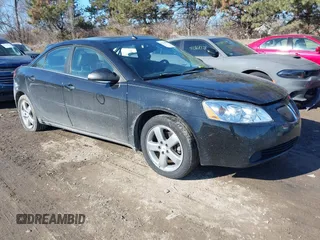 2005 Pontiac G6 GT with VIN 1G2ZH528354169479, listed as a IAAI auction lot 41430508 with 241,576 mi miles. Bid and sale history available at carsss.com. Image 1.