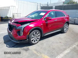 2021 Cadillac XT4 FWD Premium Luxury z VIN 1GYFZCR48MF004849, wystawiony jako IAAI lot #42131896 z przebiegiem 9 864 mil mil oraz . Historia ofert i sprzedaży dostępna na DreamBid. Obrazek 17.