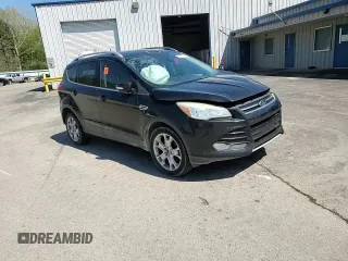 2016 Ford Escape Titanium with VIN 1FMCU0J91GUB09161, listed as a Copart auction lot 50027315 with 106,784 mi miles and Salvage Title. Bid and sale history available at carsss.com. Image 11.