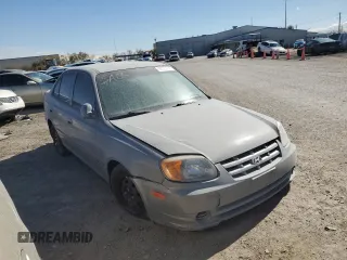 2003 Hyundai Accent GL with VIN KMHCG45C13U455449, listed as a Copart auction lot 42625285 with 0 mi miles and Salvage Title. Bid and sale history available at carsss.com. Image 4.