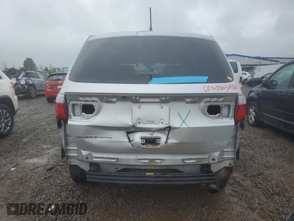 2012 Dodge Durango SXT with VIN 1C4RDJAG4CC106273, listed as a Copart auction lot 59767205 with 223,098 mi miles and Salvage title. Bid and sale history available at DreamBid. Image 6.