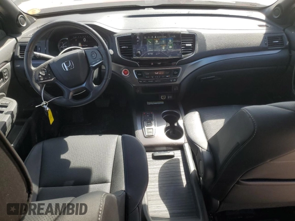 2023 Honda Passport EX-L with VIN 5FNYF8H57PB007264, listed as a Copart auction lot 48942955 with 18,013 mi miles and Salvage Title. Bid and sale history available at DreamBid. Image 8.
