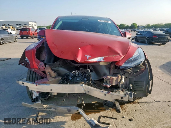 2023 Tesla Model Y Long Range z VIN 7SAYGDEE8PA138780, wystawiony jako Copart lot #53294385 z przebiegiem 137 496 mil mil oraz Szkoda całkowita • Salvage title. Historia ofert i sprzedaży dostępna na DreamBid. Obrazek 5.