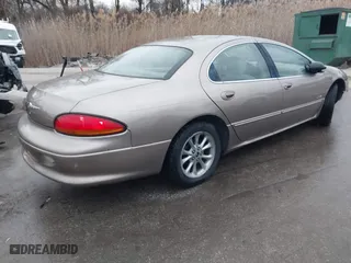 2000 Chrysler LHS with VIN 2C3HC56G9YH180828, listed as a IAAI auction lot 41504718 with 153,670 mi miles. Bid and sale history available at carsss.com. Image 4.