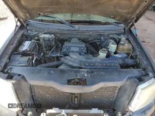 2005 Ford F-150 XLT z VIN 1FTPW12565FA07910, wystawiony jako Copart lot #58243005 z przebiegiem 268 744 mil mil oraz Szkoda całkowita • Salvage title. Historia ofert i sprzedaży dostępna na DreamBid. Obrazek 11.