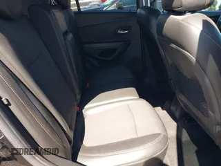 2019 Chevrolet Trax LT z VIN KL7CJLSB9KB912284, wystawiony jako IAAI lot #42298398 z przebiegiem 103 053 mil mil oraz . Historia ofert i sprzedaży dostępna na DreamBid. Obrazek 8.