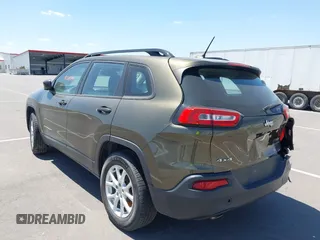 2015 Jeep Cherokee Sport with VIN 1C4PJMAB9FW595102, listed as a IAAI auction lot 42257918 with 95,059 mi miles and . Bid and sale history available at DreamBid. Image 3.