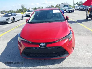 2021 Toyota Corolla Hybrid LE with VIN JTDEAMDE5MJ012662, listed as a IAAI auction lot 41421205 with 138,533 mi miles. Bid and sale history available at carsss.com. Image 6.