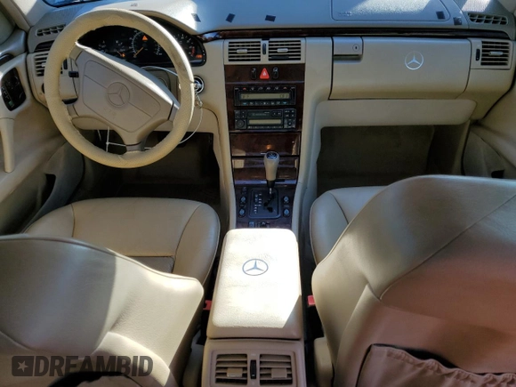 1998 Mercedes-Benz E-Class with VIN WDBJF65FXWA497997, listed as a Copart auction lot 87969125 with 145,322 mi miles and Salvage Title. Bid and sale history available at carsss.com. Image 8.