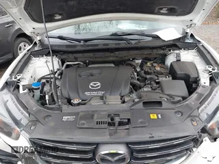 2016 Mazda CX-5 Grand Touring with VIN JM3KE4DY3G0838204, listed as a IAAI auction lot 41961049 with 98,918 mi miles and . Bid and sale history available at carsss.com. Image 10.