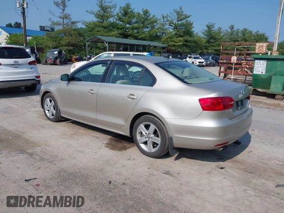 2014 Volkswagen Jetta TDI w/Premium with VIN 3VW3L7AJ3EM319365, listed as a IAAI auction lot 42479875 with 133,068 mi miles and . Bid and sale history available at DreamBid. Image 3.
