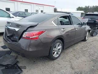 2014 Nissan Altima S with VIN 1N4AL3AP7EC185779, listed as a IAAI auction lot 41730487 with 112,503 mi miles and . Bid and sale history available at DreamBid. Image 4.