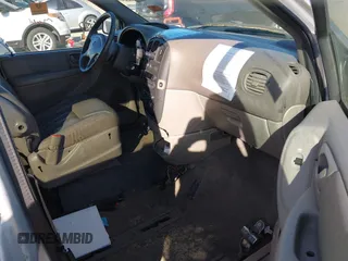 2003 Dodge Grand Caravan with VIN 2D4GP74L83R157134, listed as a IAAI auction lot 41698861 with 155,818 mi miles and . Bid and sale history available at DreamBid. Image 5.