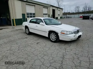 2007 Lincoln Town Car Signature Limited z VIN 1LNHM82WX7Y628758, wystawiony jako Copart lot #55057565 z przebiegiem 101 057 mil mil oraz Szkoda całkowita • Salvage title. Historia ofert i sprzedaży dostępna na DreamBid. Obrazek 13.