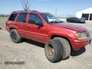 2002 Jeep Grand Cherokee Limited with VIN 1J4GW58N82C182603, listed as a Copart auction lot 57464295 with 240,179 mi miles and Salvage title. Bid and sale history available at DreamBid. Image 4.