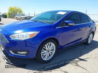 2015 Ford Focus Titanium with VIN 1FADP3J25FL314903, listed as a IAAI auction lot 42053132 with 125,418 mi miles and . Bid and sale history available at carsss.com. Image 18.