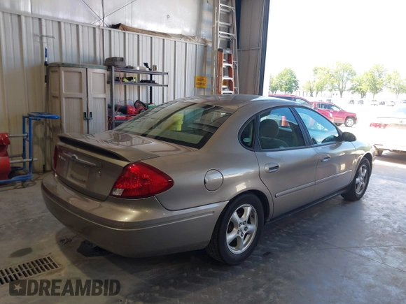 2003 Ford Taurus SE Standard with VIN 1FAFP53U13G229161, listed as a IAAI auction lot 39753697 with 94,195 mi miles. Bid and sale history available at carsss.com. Image 4.