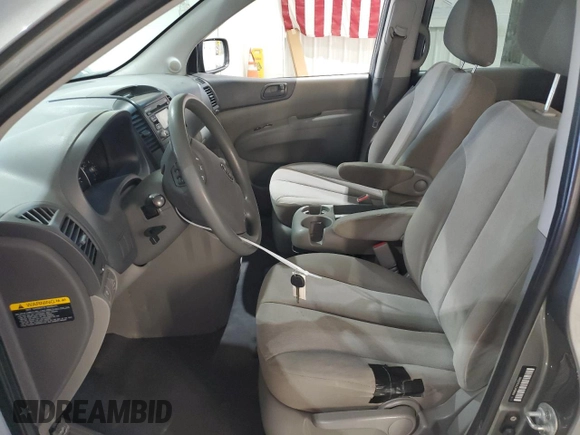 2012 Kia Sedona LX with VIN KNDMG4C79C6433461, listed as a Copart auction lot 71585454 with 164,994 mi miles and Salvage Title. Bid and sale history available at carsss.com. Image 7.