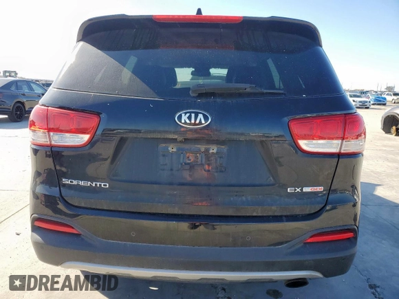 2016 Kia Sorento EX with VIN 5XYPHDA19GG025537, listed as a Copart auction lot 48769755 with 112,904 mi miles and Salvage Title. Bid and sale history available at carsss.com. Image 6.