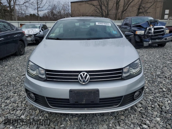 2013 Volkswagen Eos Sport с VIN WVWBW8AH4DV001901, выставлен на аукционе Copart как лот 49924065 с пробегом 60 200 миль миль и Чистый • Clean title. История ставок и продаж доступна на DreamBid. Изображение 5.