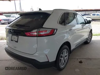 2021 Ford Edge SEL z VIN 2FMPK3J98MBA32220, wystawiony jako IAAI lot #41945825 z przebiegiem Nie podano mil oraz . Historia ofert i sprzedaży dostępna na DreamBid. Obrazek 4.