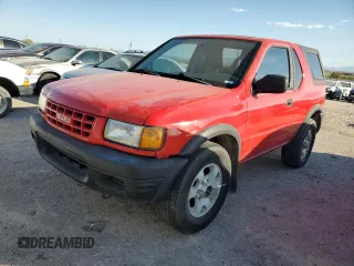 1999 Isuzu Rodeo z VIN 4S2CK57W3X4301044, wystawiony jako Copart lot #75758024 z przebiegiem 209 456 mil mil oraz Tytuł czysty. Historia ofert i sprzedaży dostępna na DreamBid. Obrazek 1.