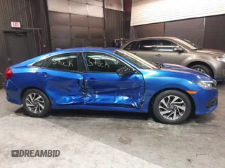 2017 Honda Civic EX z VIN 2HGFC2F71HH511341, wystawiony jako IAAI lot #42250759 z przebiegiem 252 099 mil mil oraz . Historia ofert i sprzedaży dostępna na DreamBid. Obrazek 14.
