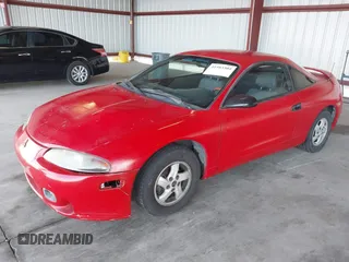 1999 Mitsubishi Eclipse RS with VIN 4A3AK34Y5XE085606, listed as a IAAI auction lot 41583304 with 277,195 mi miles and . Bid and sale history available at DreamBid. Image 2.
