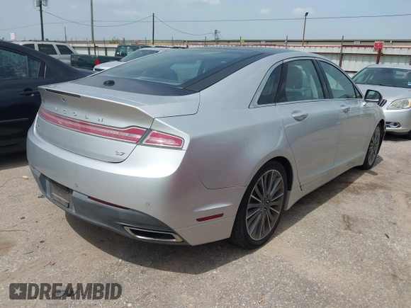 2014 Lincoln MKZ with VIN 3LN6L2GK4ER814286, listed as a IAAI auction lot 42657654 with 135,708 mi miles and . Bid and sale history available at DreamBid. Image 4.