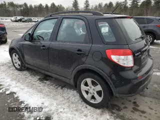 2012 Suzuki SX4 Crossover with VIN JS2YB5A30C6306884, listed as a Copart auction lot 86396074 with 91,557 mi miles and Salvage Title. Bid and sale history available at carsss.com. Image 2.