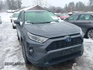 2021 Toyota RAV4 Hybrid XLE with VIN JTMRWRFVXMD127527, listed as a IAAI auction lot 41568988 with 66,358 mi miles. Bid and sale history available at carsss.com. Image 1.