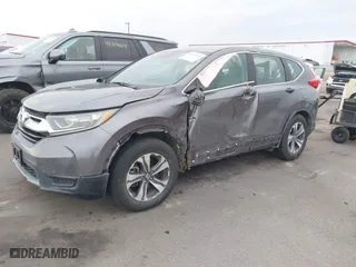 2017 Honda CR-V LX with VIN 7FARW5H32HE002156, listed as a IAAI auction lot 41697635 with 68,125 mi miles. Bid and sale history available at carsss.com. Image 2.