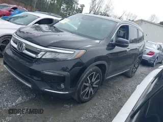 2019 Honda Pilot Touring 7-Passenger z VIN 5FNYF5H66KB027960, wystawiony jako IAAI lot #41863212 z przebiegiem 114 615 mil mil oraz . Historia ofert i sprzedaży dostępna na DreamBid. Obrazek 17.