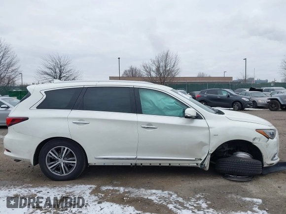 2016 Infiniti QX60 with VIN 5N1AL0MM1GC520429, listed as a IAAI auction lot 41286912 with 65,512 mi miles and . Bid and sale history available at DreamBid. Image 12.