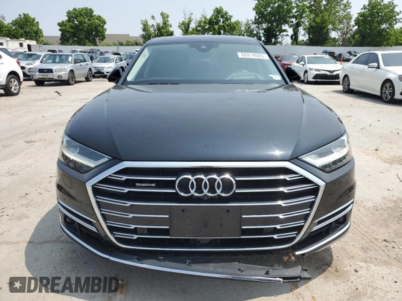 2019 Audi A8 with VIN WAU8DAF82KN020487, listed as a Copart auction lot 60214005 with 75,895 mi miles and Salvage title. Bid and sale history available at DreamBid. Image 5.