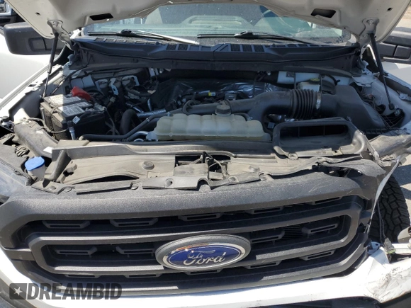 2023 Ford F-150 XL with VIN 1FTEX1CP5PKG20325, listed as a Copart auction lot 58496325 with 31,182 mi miles and Salvage title. Bid and sale history available at DreamBid. Image 11.