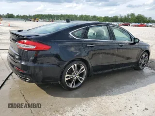 2020 Ford Fusion Titanium with VIN 3FA6P0D90LR192500, listed as a Copart auction lot 53746345 with 135,636 mi miles and Salvage title. Bid and sale history available at DreamBid. Image 3.