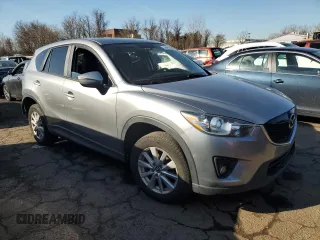 2015 Mazda CX-5 Touring with VIN JM3KE4CY5F0506569, listed as a Copart auction lot 49441035 with 160,077 mi miles and Salvage Title. Bid and sale history available at DreamBid. Image 4.